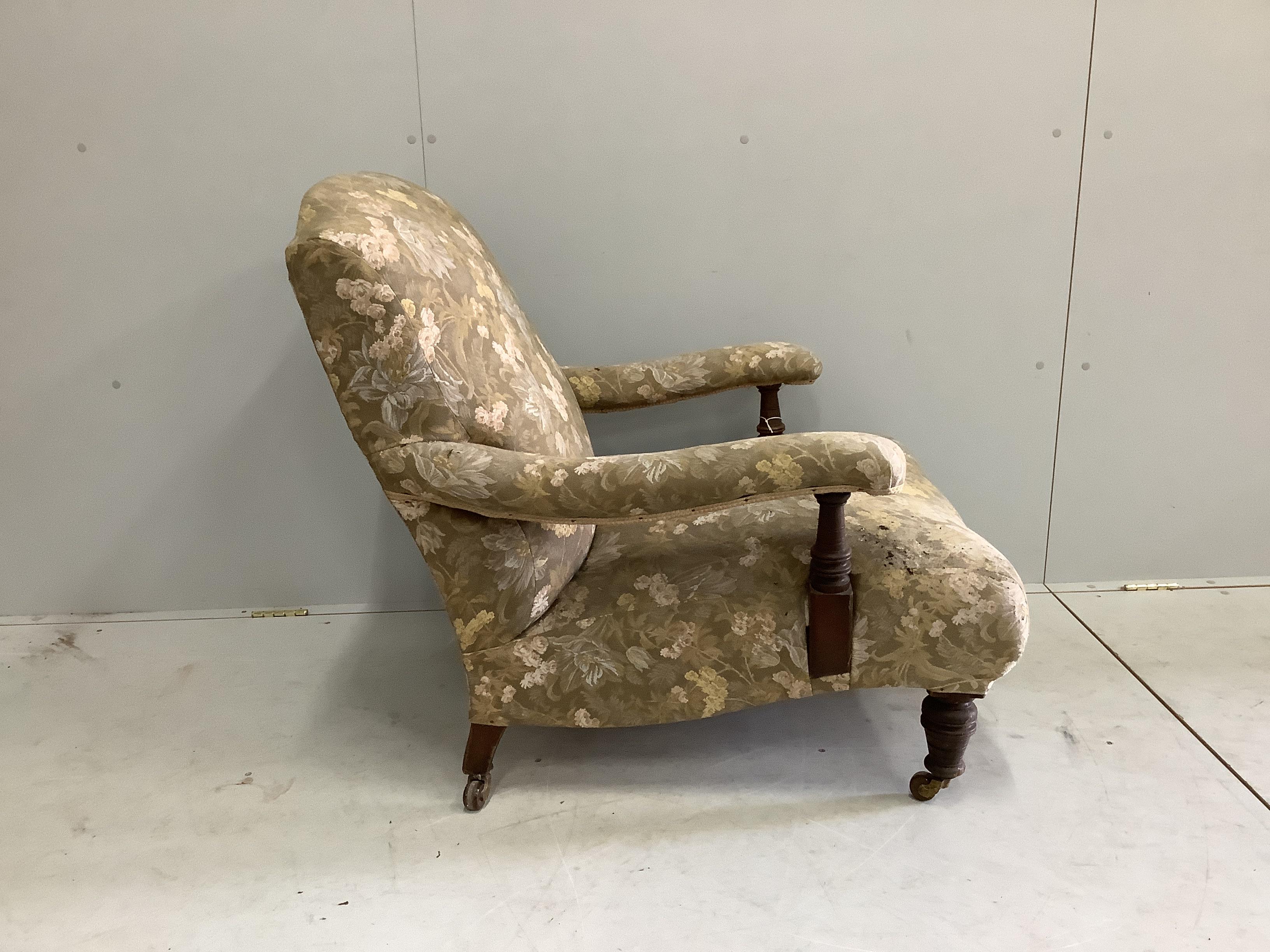 A Victorian Howard style open armchair, width 77cm, depth 84cm, height 84cm